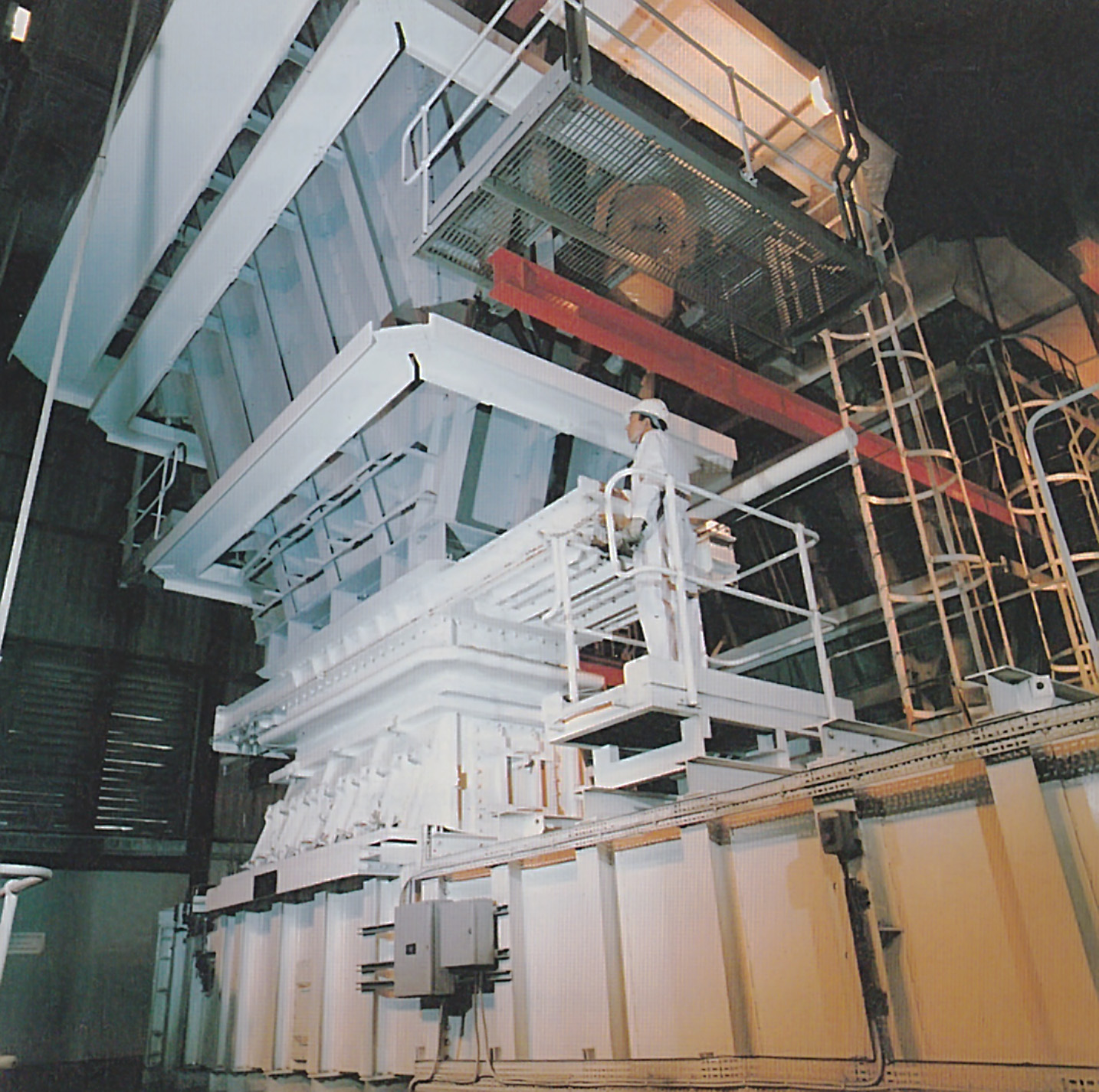 A worker inspecting glass-lined fuel bunker in 1993