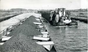 Historic view of "Tom Puddings" delivering coal to Ferrybridge