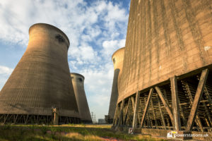 Between the cooling towers
